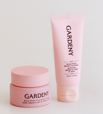 Gardeny Rose PDRN Reset & Refresh Mini Duo displayed on a clean, minimal background, highlighting the compact, travel-ready Cleansing Balm and Mask Cleanser in soft matte pink packaging. The visual reflects a gentle, hydrating two-step ritual powered by plant-based Rose PDRN for effortless makeup removal, daily renewal, and on-the-go Korean skincare hydration.