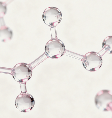 Close-up of soft pink-tinted molecular spheres representing Gardeny’s Damask Rose PDRN and Rose Callus Extract. The glossy structures also symbolize the 3-Peptide Complex that supports elasticity, smooths texture, and boosts firmness. Designed to communicate Gardeny’s blend of plant-derived PDRN with peptide-powered Korean skincare for hydrated, radiant, resilient skin.