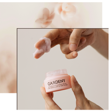 Close-up of fingers scooping the Gardeny Rose PDRN Cleansing Balm, showing its soft, buttery sorbet-like texture that melts down makeup, SPF, and impurities. The image emphasizes the balm’s hydrating skincare-powered formula infused with plant-based Rose PDRN to boost radiance, moisture retention, and deliver a comfortable cleansing ritual for all skin types.