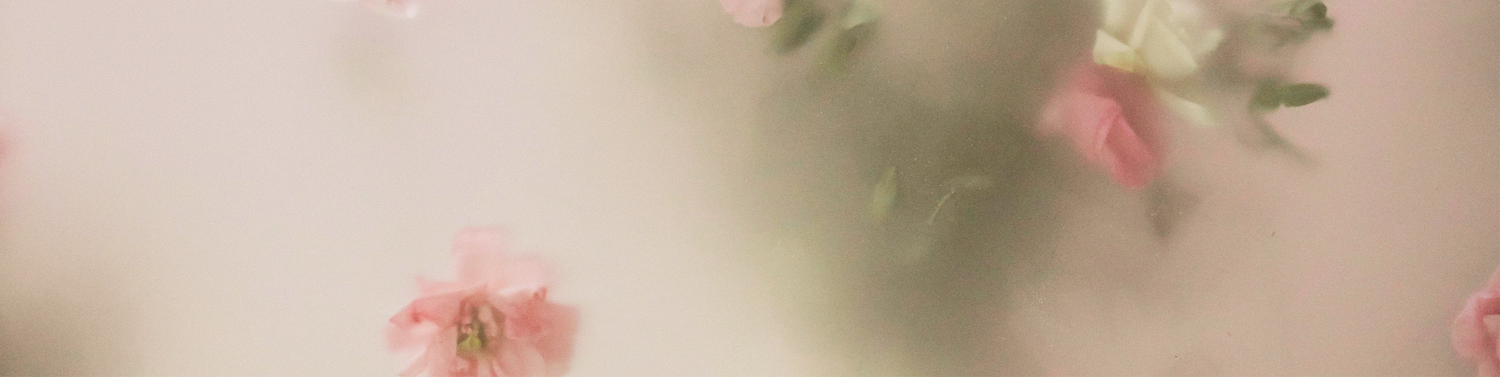 Dreamy, softly blurred pink blossoms fill the background, creating an airy, romantic atmosphere. Centered text reading “Gentle yet powerful” reflects Gardeny’s philosophy of pairing delicate, skin-first floral ingredients with clinically supported performance. The floral haze conveys the calming, hydrating, and renewing qualities of Gardeny’s rose-powered Korean skincare formulas.