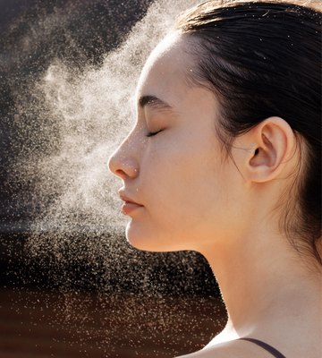 Side-profile image of a woman misting a fine cloud of Gardeny Rose PDRN Mist Toner onto her face, illustrating ultra-lightweight hydration powered by Korean plant-based Damask Rose PDRN. Shows instant glow, quick soothing comfort, and the toner’s on-the-go design that refreshes dry or tight skin without stickiness, ideal for first-time PDRN users seeking gentle daily radiance.
